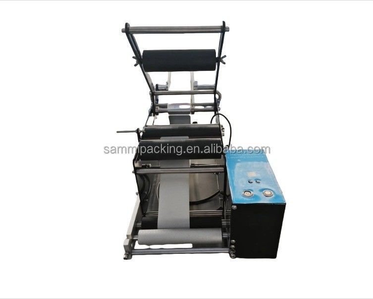 เครื่องติดป้ายชนิดที่ฉลาดสําหรับกระป๋องขวดไวน์และขวดกลม