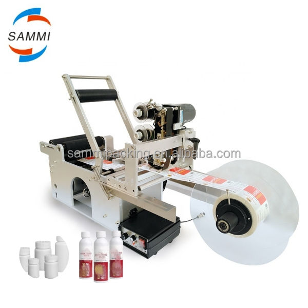 เครื่องติดฉลากสติกเกอร์กึ่งอัตโนมัติ MT-50 สำหรับขวดทรงกลม ขวดโหล สำหรับบรรจุภัณฑ์โลหะ กระดาษ แก้ว ใช้สำหรับอาหาร - ใหม่/ใช้แล้ว